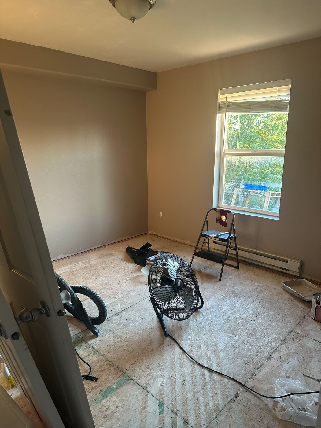 New subfloor, window and fresh paint
