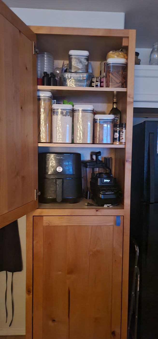Pantry cabinet with shelves